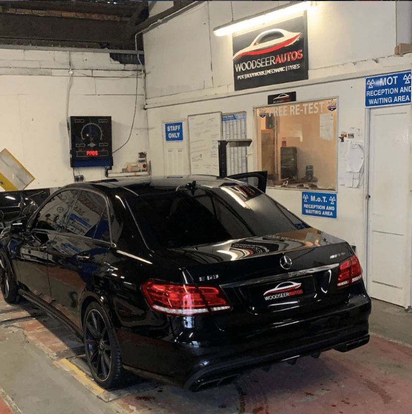 Woodseer Autos workshop with premium vehicle